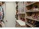 Organized walk-in closet with custom shelving for shoes and accessories at 3750 Las Vegas Blvd # 4303, Las Vegas, NV 89158