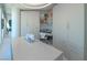 Bright craft room featuring ample counter space, custom cabinets, and modern sewing machine at 3750 Las Vegas Blvd # 4303, Las Vegas, NV 89158