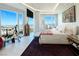 Bright bedroom with floor-to-ceiling windows and modern decor at 3750 Las Vegas Blvd # 4303, Las Vegas, NV 89158