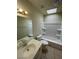 Bathroom featuring a shower-tub combination, a sink, and a toilet at 3797 Monument St, Las Vegas, NV 89121