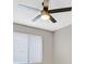 Well-lit bedroom with a contemporary ceiling fan and a window with blinds at 3849 Boca Chica Ave, Las Vegas, NV 89120