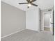 Cozy bedroom featuring a ceiling fan and large closet, perfect for storage at 3849 Boca Chica Ave, Las Vegas, NV 89120