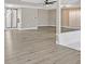 Spacious living room featuring wood flooring, fireplace and open layout at 3849 Boca Chica Ave, Las Vegas, NV 89120