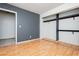 Bedroom with hardwood floors and a large closet at 4205 Thicket Ave, North Las Vegas, NV 89031