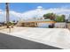 Charming single-story home featuring a two-car garage and a spacious driveway at 4205 Thicket Ave, North Las Vegas, NV 89031