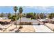 Charming home featuring a well-manicured yard, mature palm trees, and a two-car garage at 4205 Thicket Ave, North Las Vegas, NV 89031