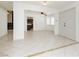Open living space featuring tile floors and access to other areas of the home at 4205 Thicket Ave, North Las Vegas, NV 89031