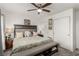 Comfortable bedroom features a ceiling fan, soft decor, and generous closet space at 4249 Fleet Dancer St, Las Vegas, NV 89129