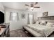 Comfortable primary bedroom with ceiling fan and soft, neutral decor at 4249 Fleet Dancer St, Las Vegas, NV 89129