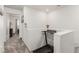 Hallway on the second floor with minimal decor and exercise machine at 4249 Fleet Dancer St, Las Vegas, NV 89129