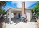 Relaxing back patio featuring a pergola, a BBQ grill, and plenty of room for entertaining at 4409 Rosebank Cir, Las Vegas, NV 89108