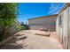A vacant backyard is fully enclosed by a block wall and features a small shed at 4409 Rosebank Cir, Las Vegas, NV 89108