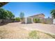 Large backyard featuring a storage shed and mature trees, offering endless possibilities for outdoor enjoyment at 4409 Rosebank Cir, Las Vegas, NV 89108
