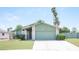 Delightful single-story home with tidy front yard and attached garage at 4409 Rosebank Cir, Las Vegas, NV 89108