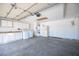 The garage includes a utility sink, laundry machines, and a refrigerator at 4409 Rosebank Cir, Las Vegas, NV 89108