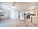 Open concept kitchen features stainless steel appliances and center island at 4409 Rosebank Cir, Las Vegas, NV 89108
