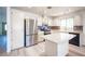 Bright kitchen with stainless steel refrigerator, ample cabinet space, and modern appliances at 4409 Rosebank Cir, Las Vegas, NV 89108