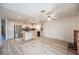 Bright, open kitchen area, features stainless steel appliances, wood look floors and island at 4409 Rosebank Cir, Las Vegas, NV 89108