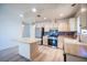 Modern kitchen featuring stainless steel appliances, sleek countertops and a functional island at 4409 Rosebank Cir, Las Vegas, NV 89108