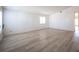 Bright and airy living room featuring sleek flooring and a large window at 4409 Rosebank Cir, Las Vegas, NV 89108