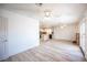 Spacious living room with kitchen and fireplace at 4409 Rosebank Cir, Las Vegas, NV 89108