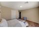 Bright bedroom features soft natural light and a cozy bed with a patterned throw at 4535 Mission Meadow Cir, Las Vegas, NV 89139