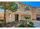 Lovely two-story home featuring a well-manicured lawn and inviting front entrance at 4535 Mission Meadow Cir, Las Vegas, NV 89139