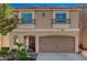 Charming two-story home with front yard landscaping and a two-car garage at 4535 Mission Meadow Cir, Las Vegas, NV 89139