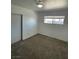 Cozy bedroom featuring carpet, window and closet at 4560 Rancho Hills Dr, Las Vegas, NV 89119