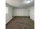 Spacious living room with neutral paint, carpet flooring and natural light at 4560 Rancho Hills Dr, Las Vegas, NV 89119