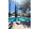 Backyard pool with mature trees and a spacious patio at 4560 Rancho Hills Dr, Las Vegas, NV 89119
