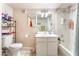 Cozy bathroom with white vanity, and shower-tub combination at 4648 Krissylouise Way, Las Vegas, NV 89121