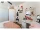 The bedroom has an illuminated vanity table and white closets at 4648 Krissylouise Way, Las Vegas, NV 89121
