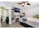 Bedroom featuring a makeup vanity, TV, and neutral decor at 4648 Krissylouise Way, Las Vegas, NV 89121