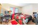 Bedroom featuring a desk and a bed with decorative floral pattern at 4648 Krissylouise Way, Las Vegas, NV 89121