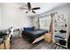 Bright bedroom with a ceiling fan, window, and neutral decor at 4648 Krissylouise Way, Las Vegas, NV 89121