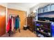 Relaxing bedroom with a closet for storage, clothing rack, and a TV at 4648 Krissylouise Way, Las Vegas, NV 89121