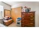 Bedroom showcasing dresser, sliding-door closet and carpet flooring at 4648 Krissylouise Way, Las Vegas, NV 89121