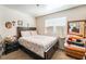 Relaxing bedroom featuring a comfortable bed and natural light at 4648 Krissylouise Way, Las Vegas, NV 89121
