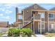 Inviting two-story condo featuring a private entrance and well-maintained landscaping at 4648 Krissylouise Way, Las Vegas, NV 89121