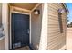 Welcoming front door with security screen and porch light, enhancing curb appeal and security at 4648 Krissylouise Way, Las Vegas, NV 89121
