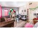 A spacious living room with hardwood floors and neutral decor at 4648 Krissylouise Way, Las Vegas, NV 89121