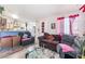 Cozy living room features hardwood-style floors and comfortable seating area, perfect for relaxation at 4648 Krissylouise Way, Las Vegas, NV 89121