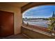 Balcony featuring a brown door and a view of the city at 4655 Gold Dust Ave # 206, Las Vegas, NV 89120