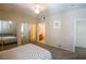 Bedroom features a mirrored closet and an ensuite bathroom at 4655 Gold Dust Ave # 206, Las Vegas, NV 89120