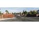 Apartment building entrance and gate, set in a well-maintained landscape at 4655 Gold Dust Ave # 206, Las Vegas, NV 89120