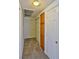 Hallway with neutral carpet and white doors provides access to other rooms at 4655 Gold Dust Ave # 206, Las Vegas, NV 89120