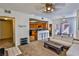 Bright living room and kitchen featuring a breakfast bar and access to dining and a bedroom at 4655 Gold Dust Ave # 206, Las Vegas, NV 89120