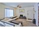 Inviting living room features plush carpeting and comfortable contemporary sofas at 4655 Gold Dust Ave # 206, Las Vegas, NV 89120