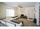 Inviting living room features plush carpeting and comfortable contemporary sofas at 4655 Gold Dust Ave # 206, Las Vegas, NV 89120